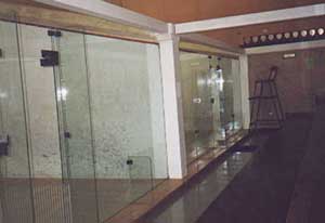 The popular UWA glass-backed courts. White paint anyone?